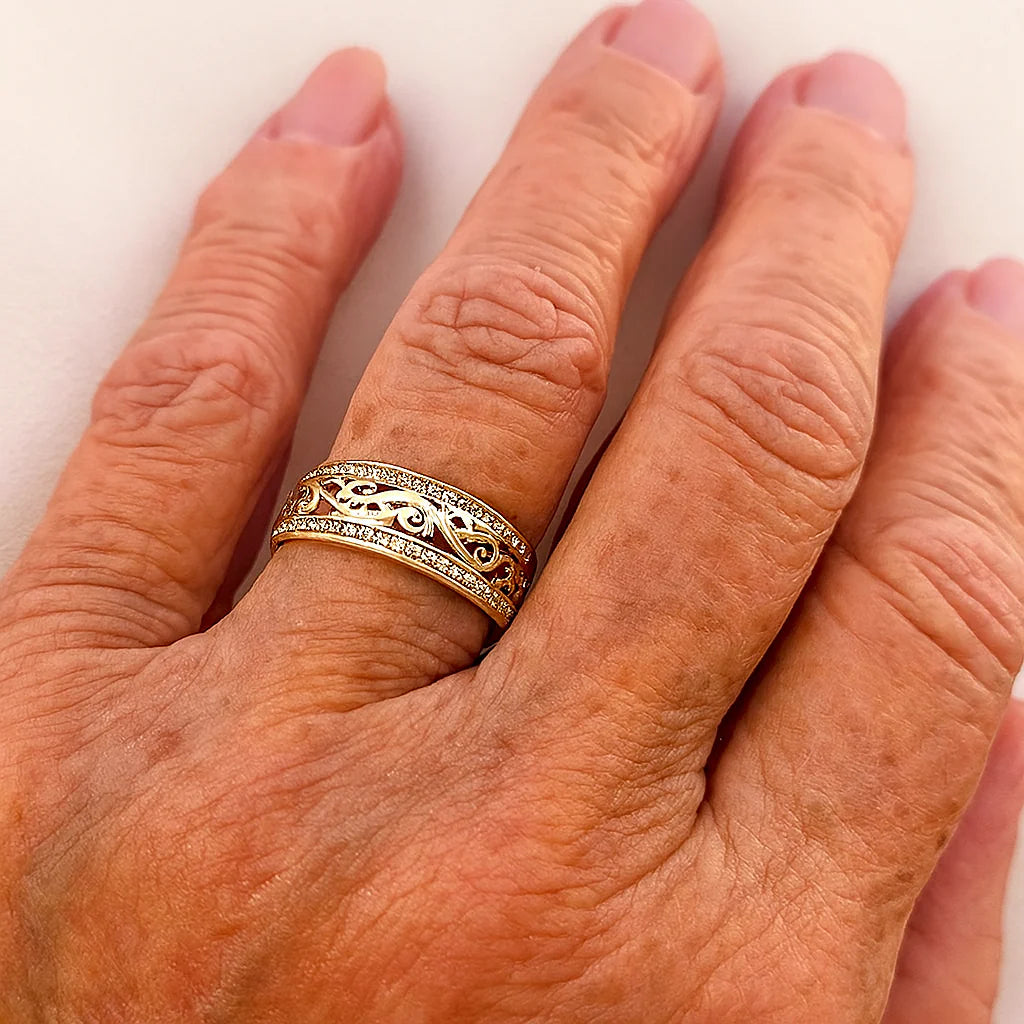 Elegant Hollow-Design Gold-Tone Ring in Stainless Steel