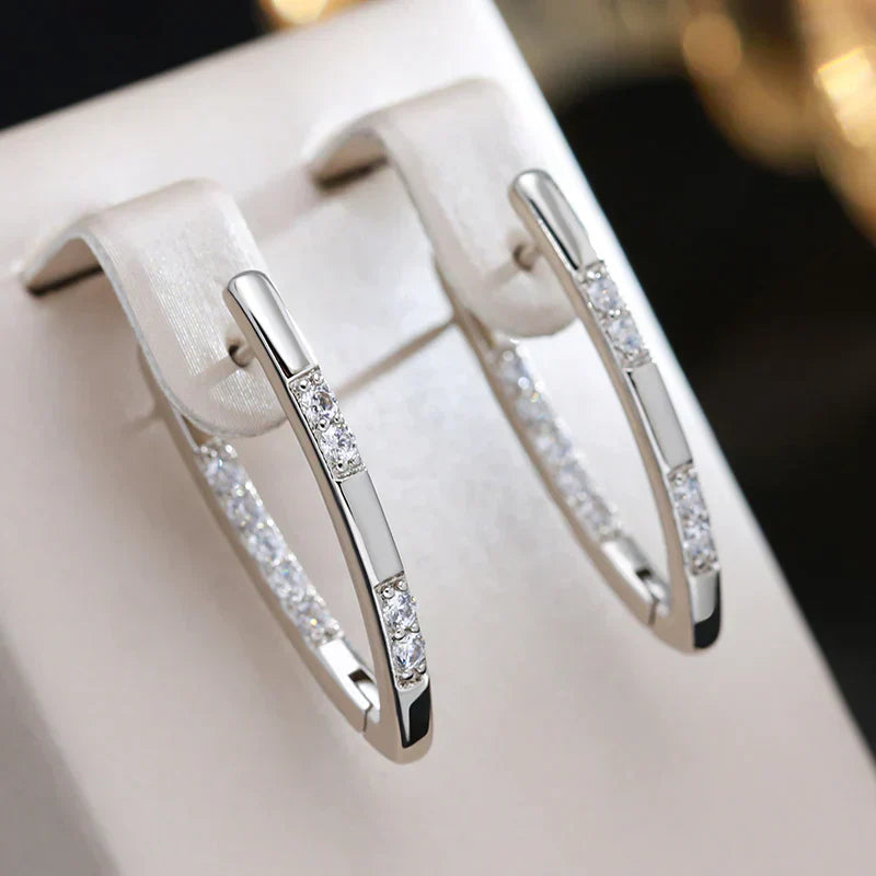 "Bennet New York - Elegant Zirconia Hoop Earrings in Stainless Steel"